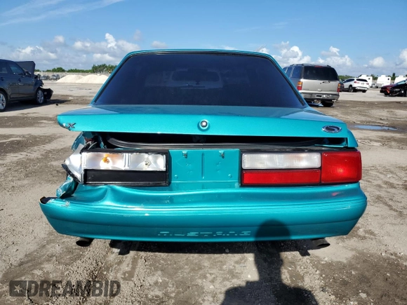 1993 Ford Mustang z VIN 1FACP40E9PF168633, wystawiony jako Copart lot #71578014 z przebiegiem 954 mil mil oraz Szkoda całkowita • Salvage title. Historia ofert i sprzedaży dostępna na DreamBid. Obrazek 6.