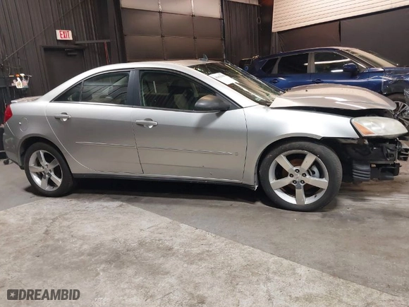 2007 Pontiac G6 GXP with VIN 1G2ZM577874202927, listed as a IAAI auction lot 41415910 with 131,987 mi miles. Bid and sale history available at carsss.com. Image 14.