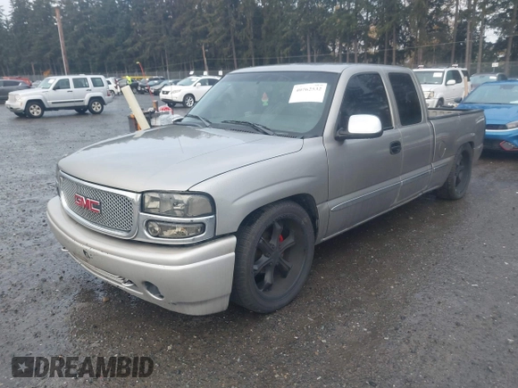 2001 GMC Sierra 1500 SLE z VIN 2GTEC19V711312775, wystawiony jako IAAI lot #40762532 z przebiegiem 230 372 mil mil oraz . Historia ofert i sprzedaży dostępna na DreamBid. Obrazek 2.