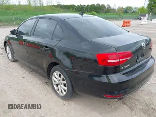 2015 Volkswagen Jetta SE z VIN 3VWD17AJ8FM321933, wystawiony jako IAAI lot #41177805 z przebiegiem 125 987 mil mil oraz . Historia ofert i sprzedaży dostępna na DreamBid. Obrazek 3.
