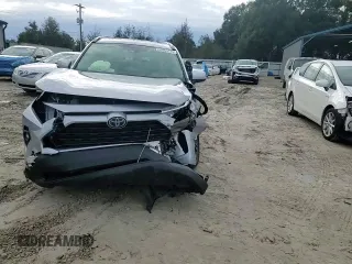2023 Toyota RAV4 Hybrid XLE Premium z VIN JTMB6RFV8PD115723, wystawiony jako Copart lot #88005175 z przebiegiem 18 363 mil mil oraz Szkoda całkowita • Salvage title. Historia ofert i sprzedaży dostępna na DreamBid. Obrazek 14.