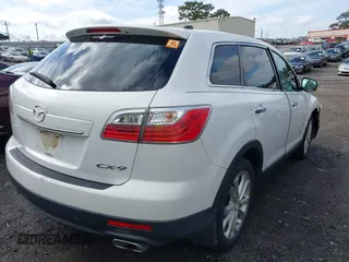 2011 Mazda CX-9 Grand Touring with VIN JM3TB2DA8B0301776, listed as a IAAI auction lot 41582526 with 233,661 mi miles. Bid and sale history available at carsss.com. Image 4.
