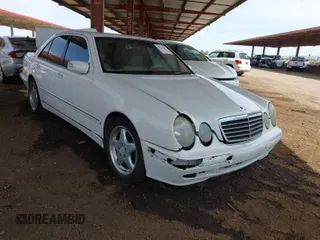 2001 Mercedes-Benz E-Class with VIN WDBJF65J61B183965, listed as a IAAI auction lot 41926279 with 305,436 mi miles. Bid and sale history available at carsss.com. Image 1.