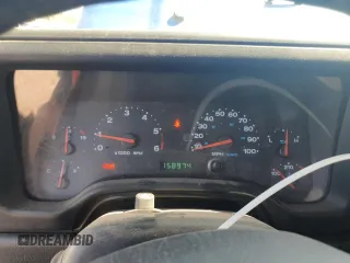 2003 Jeep Wrangler Sport z VIN 1J4FA49S53P350281, wystawiony jako Copart lot #56634005 z przebiegiem 158 974 mil mil oraz Szkoda całkowita • Salvage title. Historia ofert i sprzedaży dostępna na DreamBid. Obrazek 9.