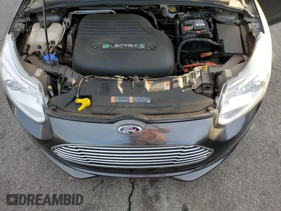 2015 Ford Focus Electric with VIN 1FADP3R40FL348785, listed as a Copart auction lot 84516374 with 85,633 mi miles and Salvage title. Bid and sale history available at DreamBid. Image 11.