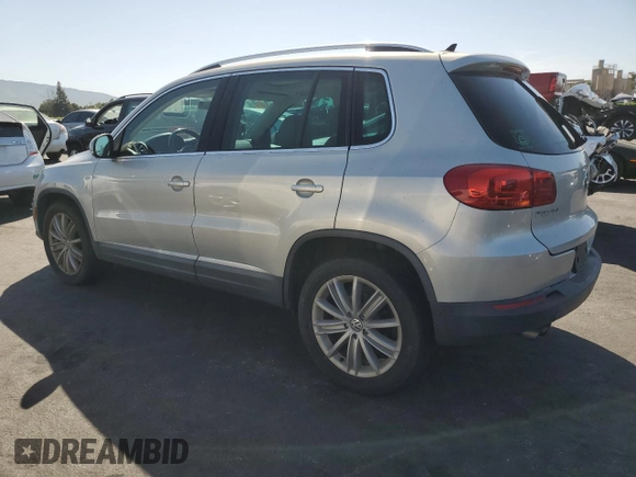 2012 Volkswagen Tiguan SEL with VIN WVGAV7AXXCW521394, listed as a Copart auction lot 53000555 with 126,017 mi miles and Salvage Title. Bid and sale history available at DreamBid. Image 2.