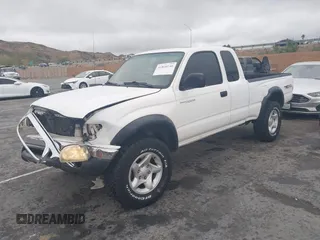 2001 Toyota Tacoma z VIN 5TEWN72N11Z820568, wystawiony jako IAAI lot #41820146 z przebiegiem 188 430 mil mil oraz . Historia ofert i sprzedaży dostępna na DreamBid. Obrazek 2.