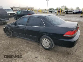 2001 Honda Accord LX z VIN 1HGCG56401A047218, wystawiony jako Copart lot #55053285 z przebiegiem 214 849 mil mil oraz Szkoda całkowita • Salvage title. Historia ofert i sprzedaży dostępna na DreamBid. Obrazek 2.