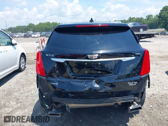 2018 Cadillac XT5 Premium Luxury AWD z VIN 1GYKNFRS3JZ112459, wystawiony jako IAAI lot #42590258 z przebiegiem 157 377 mil mil oraz . Historia ofert i sprzedaży dostępna na DreamBid. Obrazek 16.