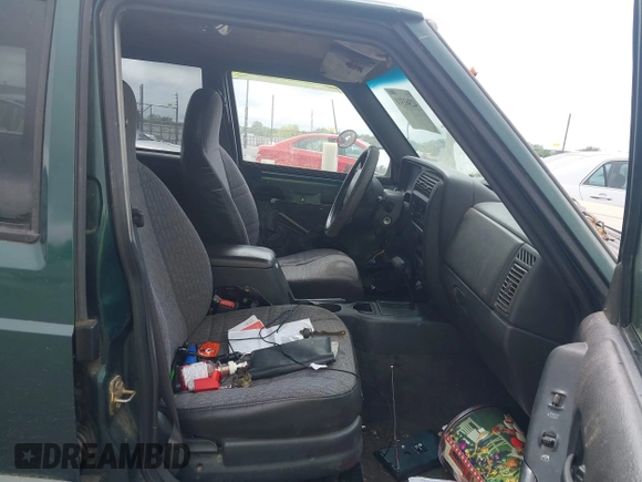 2000 Jeep Cherokee with VIN 1J4FT48S4YL240347, listed as a IAAI auction lot 42361311 with Not provided miles and . Bid and sale history available at DreamBid. Image 5.