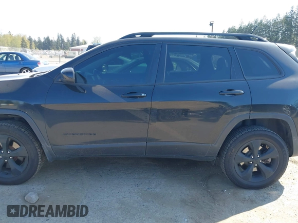 2015 Jeep Cherokee North with VIN 1C4PJMCS3FW777973, listed as a IAAI auction lot 42043203 with 158,536 mi miles. Bid and sale history available at carsss.com. Image 15.
