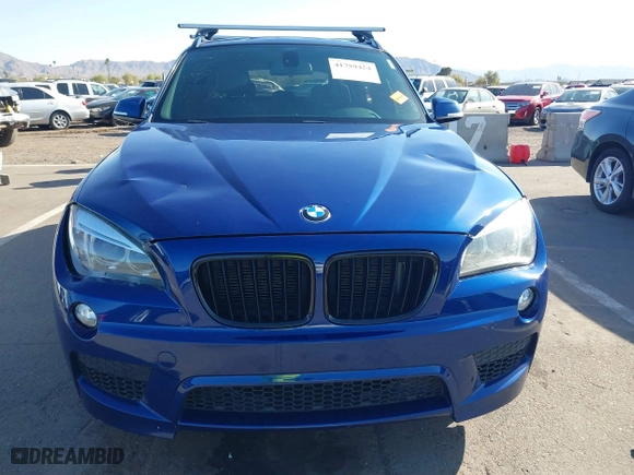 2015 BMW X1 xDrive28i with VIN WBAVL1C56FVY32753, listed as a IAAI auction lot 41759454 with 130,823 mi miles. Bid and sale history available at carsss.com. Image 12.
