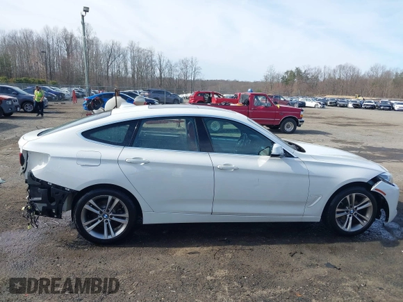 2018 BMW 3 Series 330i xDrive with VIN WBA8Z9C57JB220047, listed as a IAAI auction lot 41721186 with 66,725 mi miles. Bid and sale history available at carsss.com. Image 14.