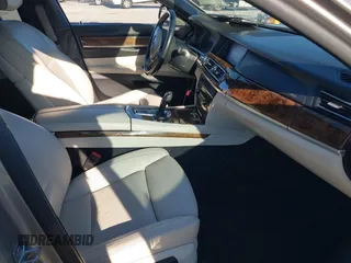 2015 BMW 7 Series 750Li with VIN WBAYE8C55FD782384, listed as a IAAI auction lot 41319363 with 75,784 mi miles. Bid and sale history available at carsss.com. Image 5.