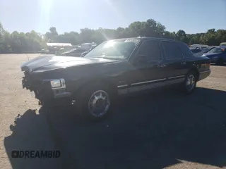 1997 Lincoln Town Car Signature z VIN 1LNLM82W0VY755395, wystawiony jako Copart lot #60832324 z przebiegiem 143 323 mil mil oraz Szkody całkowita. Historia ofert i sprzedaży dostępna na DreamBid. Obrazek 1.