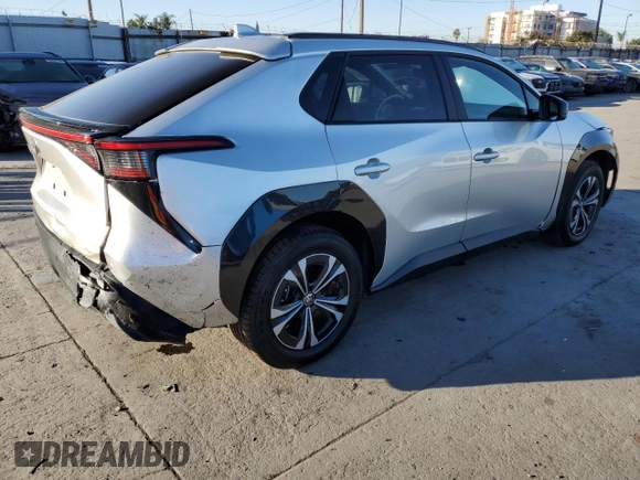 2023 Toyota bZ4X XLE with VIN JTMAAAAA8PA015784, listed as a Copart auction lot 56072755 with 21,387 mi miles and Salvage Title. Bid and sale history available at DreamBid. Image 3.