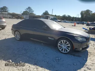 2011 BMW 7 Series with VIN WBAKX8C55BC198177, listed as a Copart auction lot 77016924 with 99,275 mi miles and Salvage title. Bid and sale history available at DreamBid. Image 4.