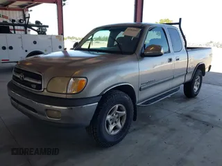 2001 Toyota Tundra SR5 with VIN 5TBRT34191S163739, listed as a IAAI auction lot 41964307 with 268,804 mi miles and . Bid and sale history available at DreamBid. Image 2.