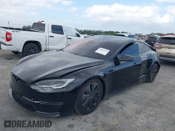 2023 Tesla Model S with VIN 5YJSA1E53PF510757, listed as a IAAI auction lot 42075624 with Not provided miles and . Bid and sale history available at DreamBid. Image 18.