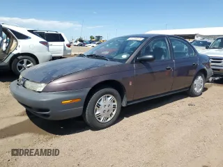 1998 Saturn SL with VIN 1G8ZH528XWZ140961, listed as a Copart auction lot 61259575 with 237,291 mi miles and Salvage title. Bid and sale history available at DreamBid. Image 1.