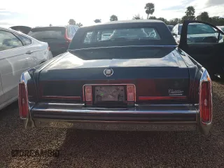 1989 Cadillac Brougham z VIN 1G6DW51Y6KR723841, wystawiony jako Copart lot #74548864 z przebiegiem 74 705 mil mil oraz Szkody całkowita. Historia ofert i sprzedaży dostępna na DreamBid. Obrazek 6.