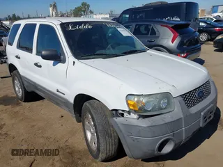 2006 Ford Escape Hybrid with VIN 1FMCU96H16KA61854, listed as a IAAI auction lot 42580035 with 264,173 mi miles and . Bid and sale history available at DreamBid. Image 1.