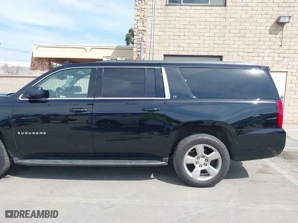 2017 Chevrolet Suburban LT with VIN 1GNSKHKC1HR202658, listed as a IAAI auction lot 41765090 with NaN miles. Bid and sale history available at carsss.com. Image 14.