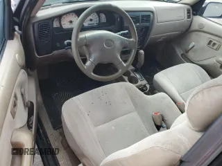 2001 Toyota Tacoma z VIN 5TEVL52N31Z723068, wystawiony jako Copart lot #58333945 z przebiegiem 302 695 mil mil oraz Czysty tytuł • Clean title. Historia ofert i sprzedaży dostępna na DreamBid. Obrazek 8.