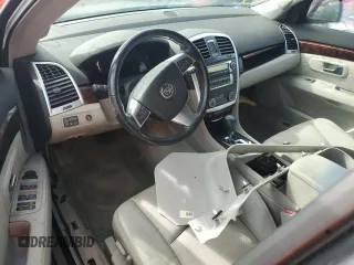2009 Cadillac SRX RWD z VIN 1GYEE637790101241, wystawiony jako Copart lot #78983654 z przebiegiem Nie podano mil oraz Szkoda całkowita • Salvage title. Historia ofert i sprzedaży dostępna na DreamBid. Obrazek 8.
