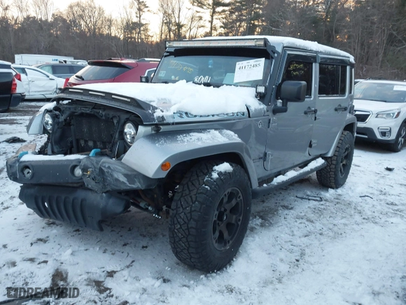 2015 Jeep Wrangler Unlimited Rubicon Hard Rock with VIN 1C4HJWFG1FL659803, listed as a IAAI auction lot 41172485 with 126,881 mi miles. Bid and sale history available at carsss.com. Image 17.