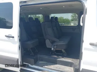 2021 Ford Transit Passenger XL z VIN 1FBAX2Y84MKA14973, wystawiony jako IAAI lot #42149017 z przebiegiem 105 171 mil mil oraz . Historia ofert i sprzedaży dostępna na DreamBid. Obrazek 8.
