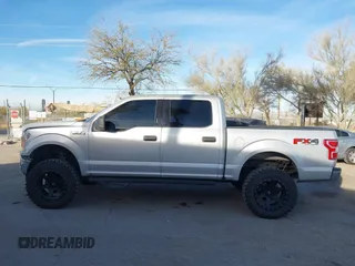 2019 Ford F-150 XL with VIN 1FTEW1E43KKE23264, listed as a IAAI auction lot 41395865 with 106,898 mi miles. Bid and sale history available at carsss.com. Image 14.