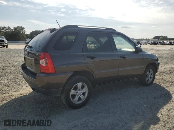 2009 Kia Sportage LX with VIN KNDJF724297573255, listed as a Copart auction lot 51300095 with 199,362 mi miles and Salvage Title. Bid and sale history available at carsss.com. Image 3.