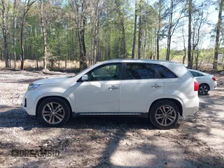 2014 Kia Sorento SX with VIN 5XYKW4A72EG492736, listed as a IAAI auction lot 42009349 with 165,492 mi miles. Bid and sale history available at carsss.com. Image 14.