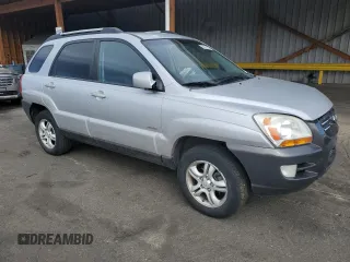 2005 Kia Sportage LX with VIN KNDJE723457117231, listed as a Copart auction lot 50163165 with 97,273 mi miles and Salvage Title. Bid and sale history available at carsss.com. Image 4.