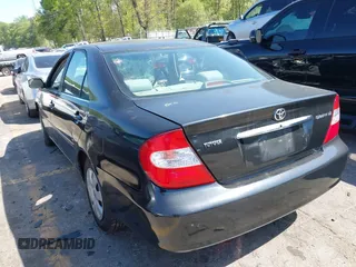 2004 Toyota Camry LE with VIN 4T1BE32K54U270040, listed as a IAAI auction lot 41984769 with Not provided miles and . Bid and sale history available at DreamBid. Image 3.