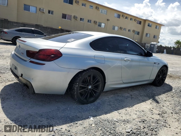 2013 BMW 6 Series 650i with VIN WBAYM9C59DDW20408, listed as a Copart auction lot 73585214 with 143,605 mi miles and Clean Title. Bid and sale history available at carsss.com. Image 3.