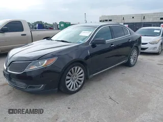 2013 Lincoln MKS with VIN 1LNHL9DK1DG608872, listed as a IAAI auction lot 42672243 with 175,935 mi miles and . Bid and sale history available at DreamBid. Image 2.