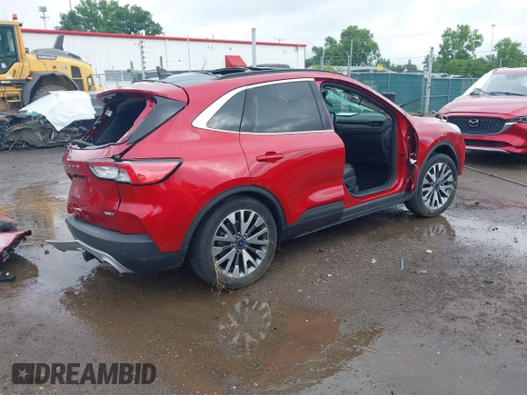 2020 Ford Escape Titanium with VIN 1FMCU9J9XLUA99423, listed as a IAAI auction lot 42511937 with 17,849 mi miles and . Bid and sale history available at DreamBid. Image 4.