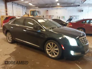 2014 Cadillac XTS Luxury with VIN 2G61M5S39E9325923, listed as a IAAI auction lot 41253343 with 69,319 mi miles. Bid and sale history available at carsss.com. Image 1.