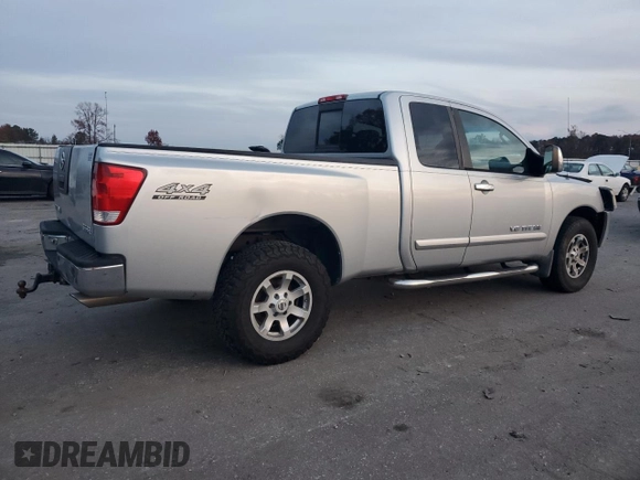 2005 Nissan Titan SE with VIN 1N6BA06B45N539629, listed as a Copart auction lot 82527074 with 154,255 mi miles and Salvage title. Bid and sale history available at DreamBid. Image 3.