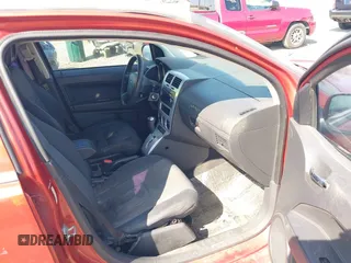 2009 Dodge Caliber SXT with VIN 1B3HB48A89D157414, listed as a IAAI auction lot 42141618 with 175,377 mi miles and . Bid and sale history available at DreamBid. Image 5.