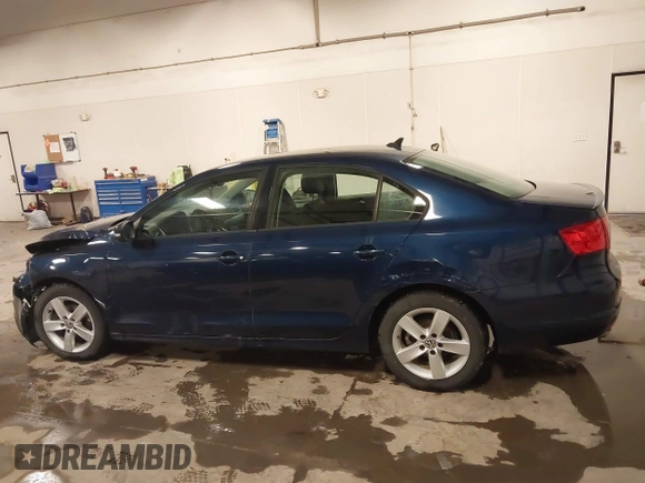 2012 Volkswagen Jetta Sedan TDI with VIN 3VW3L7AJ8CM378733, listed as a IAAI auction lot 41571197 with 151,159 mi miles. Bid and sale history available at carsss.com. Image 14.