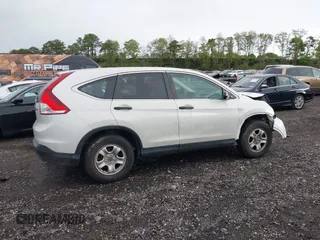 2014 Honda CR-V LX with VIN 5J6RM4H30EL088372, listed as a IAAI auction lot 42171542 with 70,418 mi miles and . Bid and sale history available at carsss.com. Image 13.