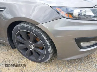 2012 Kia Optima SX with VIN 5XXGR4A6XCG077489, listed as a IAAI auction lot 42158726 with 158,229 mi miles and . Bid and sale history available at carsss.com. Image 11.