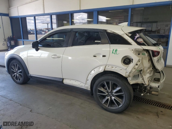 2017 Mazda CX-3 Touring with VIN JM1DKFC76H0148124, listed as a Copart auction lot 51866325 with 100,512 mi miles and Salvage Title. Bid and sale history available at carsss.com. Image 2.