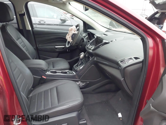 2015 Ford Escape Titanium with VIN 1FMCU0J98FUC07196, listed as a IAAI auction lot 41930660 with 51,161 mi miles and . Bid and sale history available at DreamBid. Image 5.