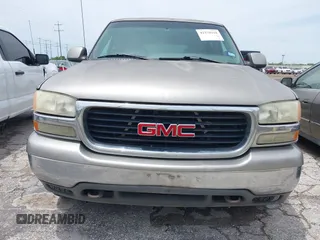 2002 GMC Yukon SLT z VIN 1GKEC13Z02R199471, wystawiony jako IAAI lot #42379318 z przebiegiem 212 157 mil mil oraz . Historia ofert i sprzedaży dostępna na DreamBid. Obrazek 6.