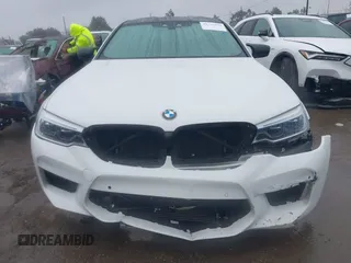2019 BMW M5 Competition z VIN WBSJF0C52KB447102, wystawiony jako IAAI lot #41778593 z przebiegiem 31 030 mil mil oraz . Historia ofert i sprzedaży dostępna na DreamBid. Obrazek 12.