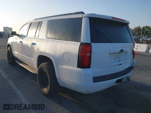 2018 Chevrolet Suburban LS with VIN 1GNSKGKC5JR173889, listed as a IAAI auction lot 42152865 with 73,358 mi miles and . Bid and sale history available at DreamBid. Image 3.